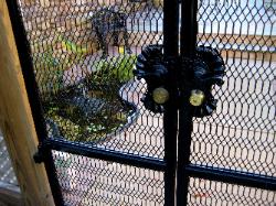This door was fabricated to keep pet cats isolated in thier own little garden paradise