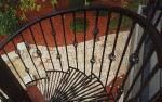 another spiral staircase with basket accents and radial grating treads